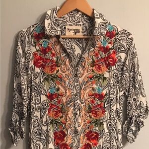 Exotic, dress with embroidered floral pattern and pockets